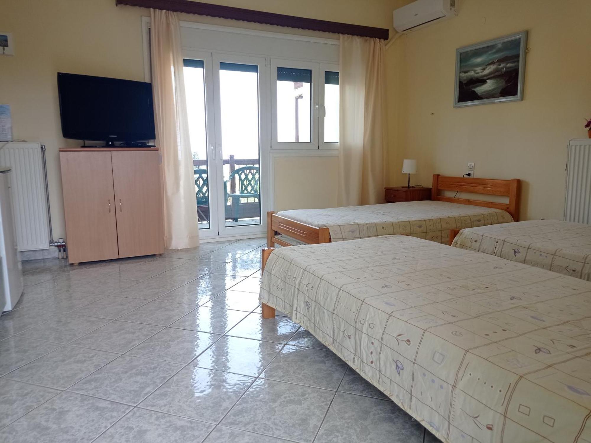 Alexandros Rooms & Studios สโกเปลอสทาวน์ ภายนอก รูปภาพ